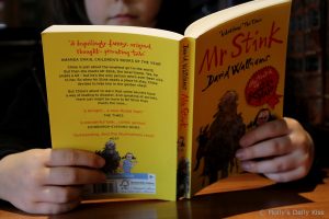 8 year old reading Mr Stink by David Walliams