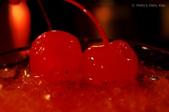 red cherries in a red drink
