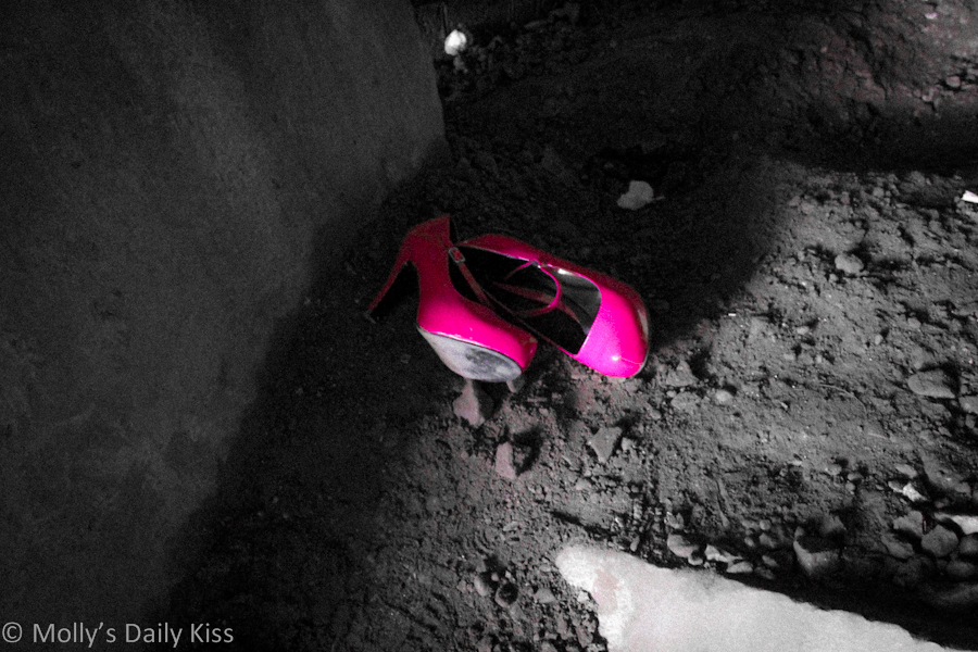 Pink shoes left in the dirty