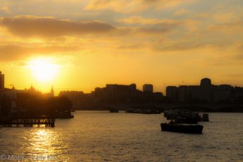 Sunset over the Thames in London skyline