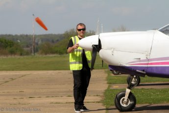 Pilot checking his plane