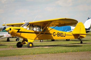 Yellow small single seat plane