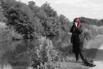 Red head woman photographer