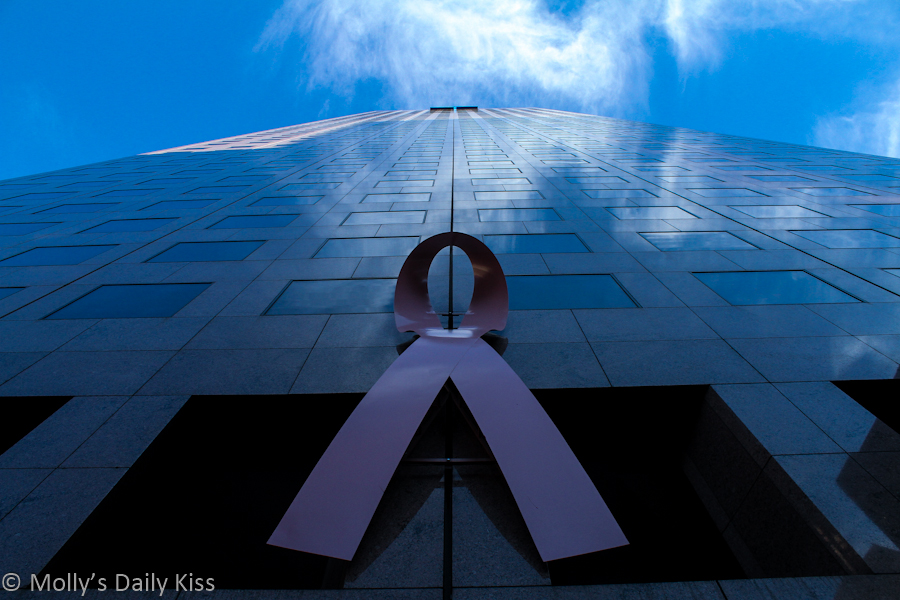 Pink breast cancer ribbon on building in Atlanta