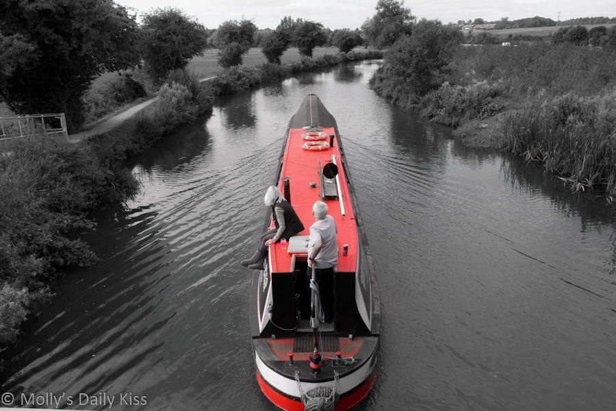 Red Canal boat on the river Stort