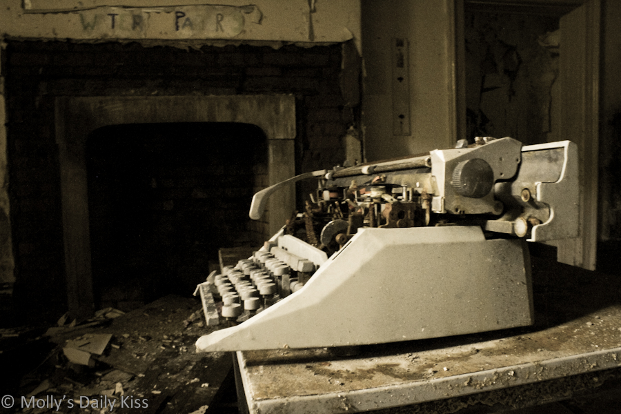 Old typewriter in abandoned house