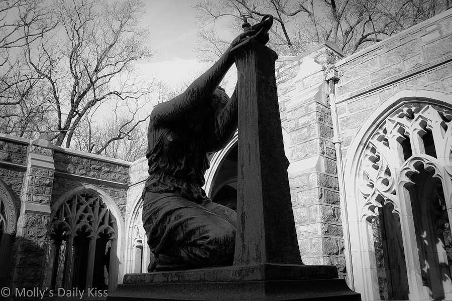 Kneeling woman statue