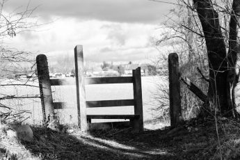 Black and white of stile gate