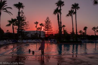 sunset in tunisia by swimming pool Sahara Beach
