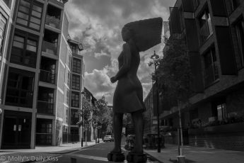 Woman on rollar skates sculpture London