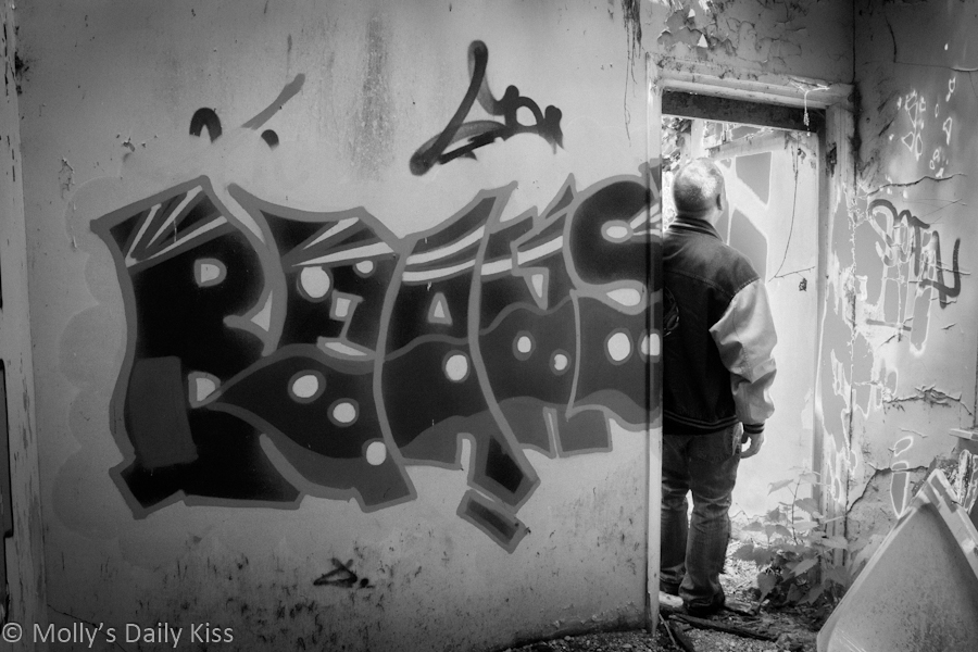 graffiti in abandoned house black and white