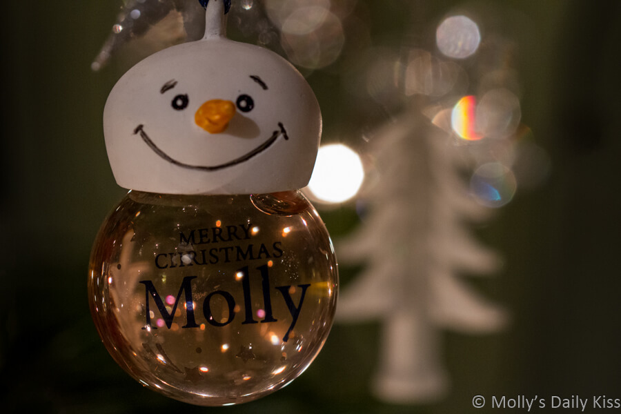 Molly Snowman bauble Merry Christmas with lights reflected