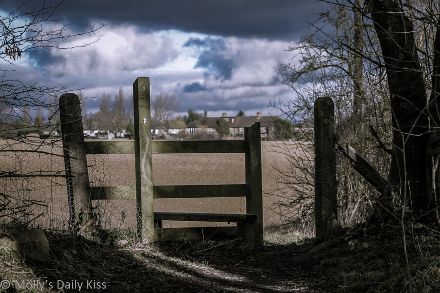 Stile gate across fields