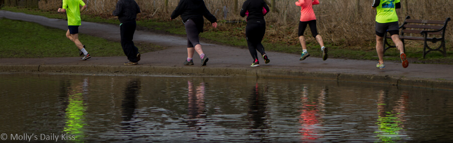 Runner feet reflected in pond St Albans