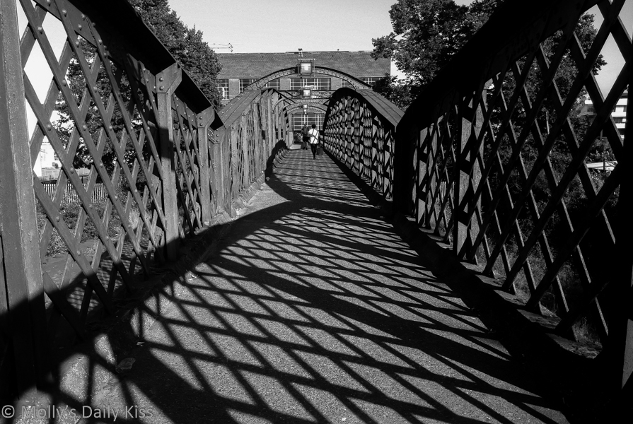 Train foot bridge in black and white. Journey on