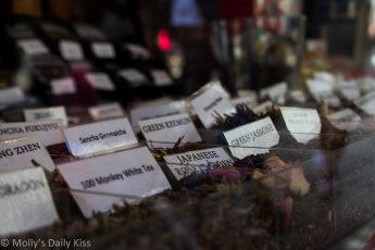 Loose leaf tea with labels in shop window