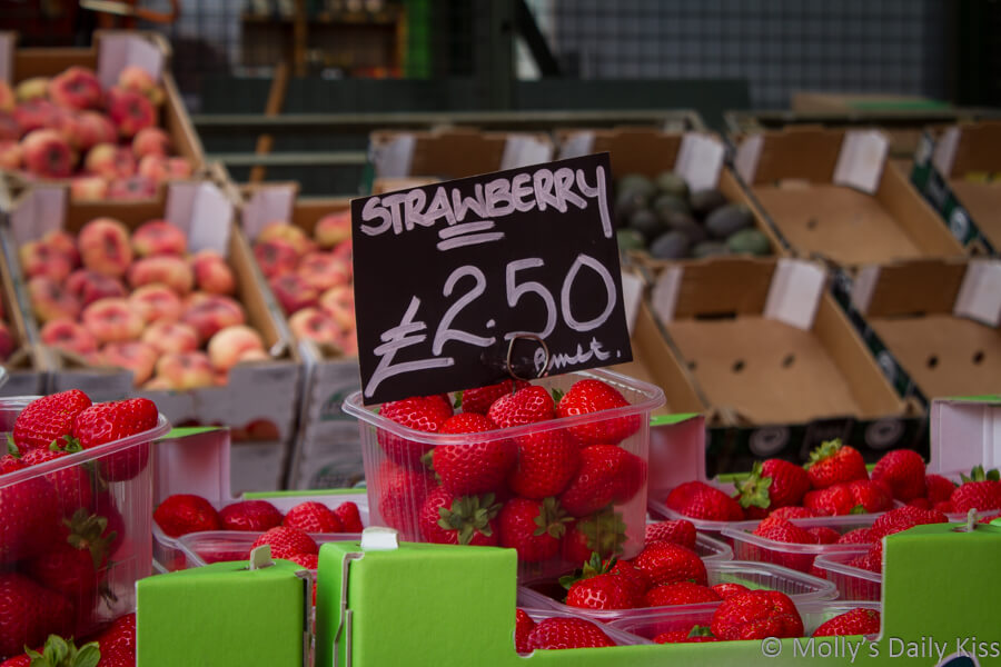 Strawberries punnets at the market in Borough market