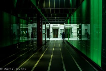 green walk tunnel under building in london is an urban form of art