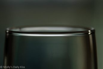 macro shot of rim of wine glass
