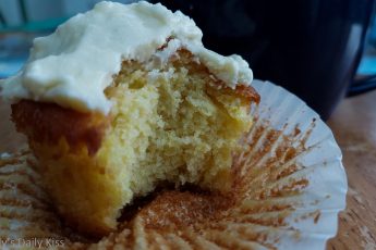 Have some cake - lemon muffin with bite taken from it