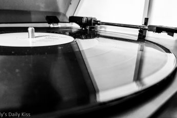 Black and white of vinyl record on record player